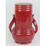 A Shorter & Son pottery vase numbered 646 to base, having mint green interior and red exterior,