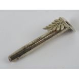 A HM silver buttonhole flower or posy holder having fern leaf design, hallmarked for Birmingham.