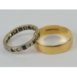 A 22ct gold band, hallmarked for Birmingham, size T, 4.