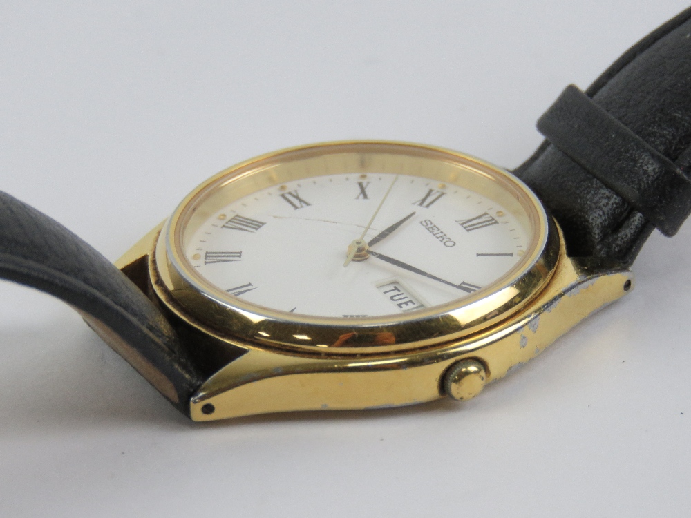 A Seiko quartz wristwatch having white dial with date and date apertures, on black leather strap. - Image 3 of 4