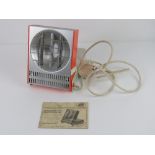 A vintage Combined Ultra Violet Infrared Health Lamp with original booklet.