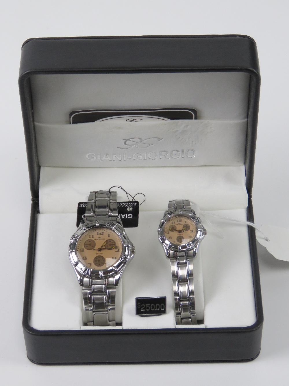 A 'His and Hers' stainless steel gents wristwatch and ladies wristwatch set, in presentation box.