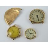 A gents 9ct gold watch head a/f, two ladies 9ct gold watch heads,