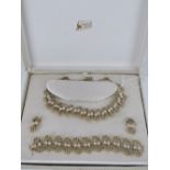 Jewelcraft; a suite of faux pearl costume jewellery comprising necklace,