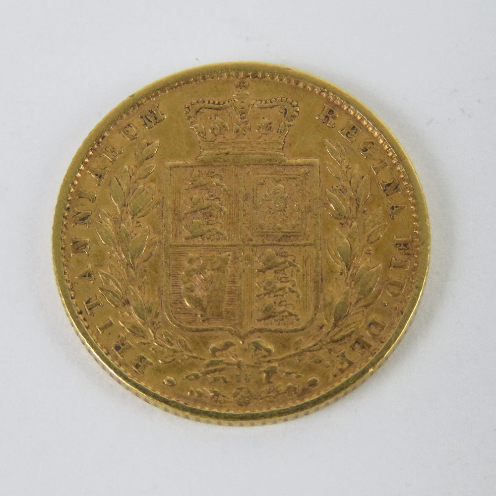 A 22ct gold 1865 Victoria sovereign, shield back, 8g. - Image 2 of 2