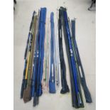 A quantity of fishing rods including a Masterfly MF90 carbon two-part fly rod in slip case,