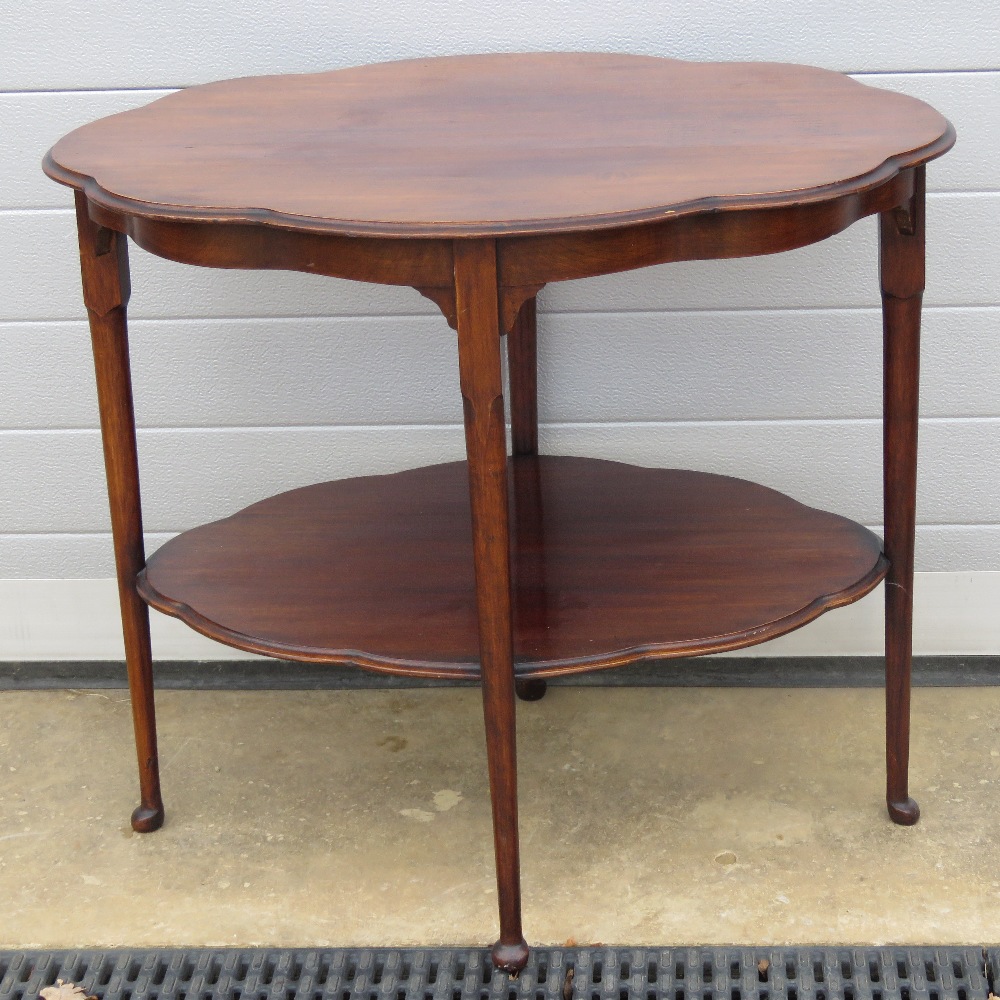 An Edwardian mahogany planter table.