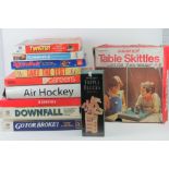 A quantity of assorted board games including Careers, Take the Test, Twister, Downfall,