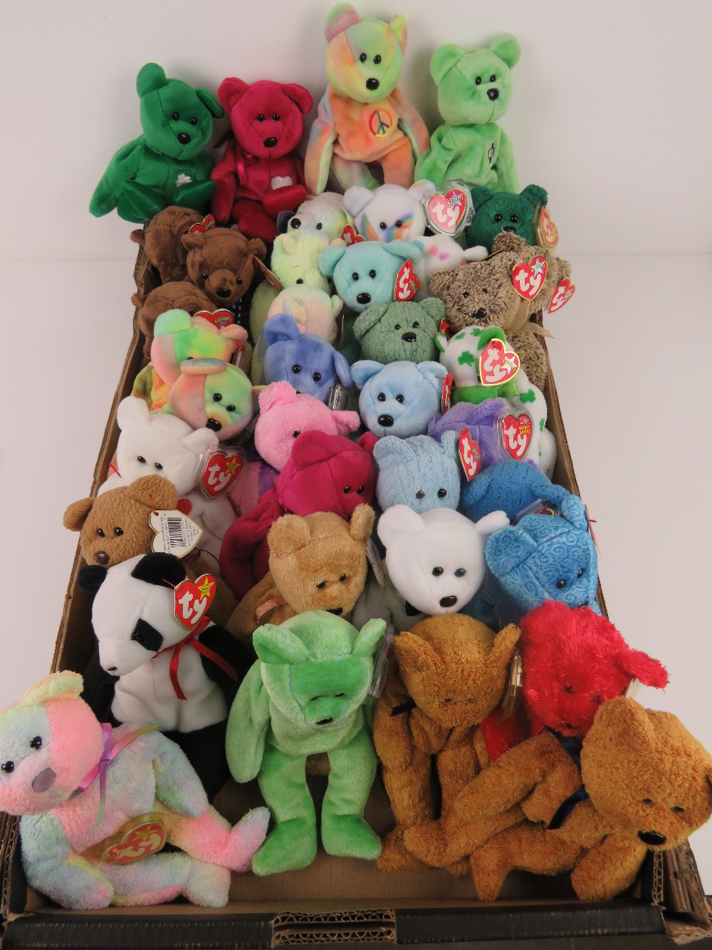 A large collection of Ty Beanie Bears/Beanie Babies all with tags; 'Hero' (x3), 'Mellow' (x3),