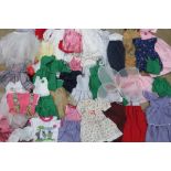 A large quantity of handmade dolls clothes for 'lifesize' doll.