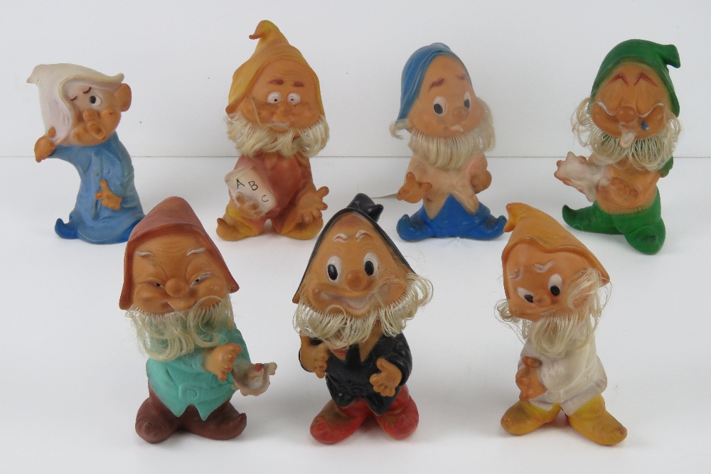 A set of seven 20th Century dwarves from Disney's Snow White, no apparent makers marks,