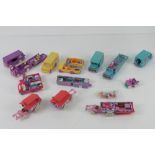 Polly Pocket; c1990s a quantity of vehicles inc three florists trucks, two school buses, campervan,