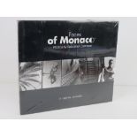 Faces of Monaco Photos by Sebastien Darrasse. Published 2004. Hardback book. In plastic wrap.