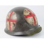 A reproduction US WWII medical helmet.
