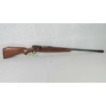 A deactivated US Mossberg Model 195K 12