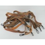 Nine WWII MG42 leather slings.