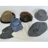 A quantity of assorted hats, various makers inc John Partridge, Barbour and Olney. Seven items.