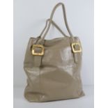 Ri2K; a beige patent ladies handbag, 100% leather outer, with dustbag, approx 17" high x 13" wide.