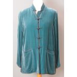 Ladies green velvet jacket size M having mandarin collar with tie fastenings and two pockets.