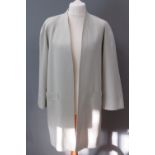 Brian Tucker; Pure new wool ladies 3/4 jacket in pale green, dry clean only label within,