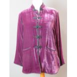 Ladies purple velvet jacket size L having mandarin collar with tie fastenings and two pockets.