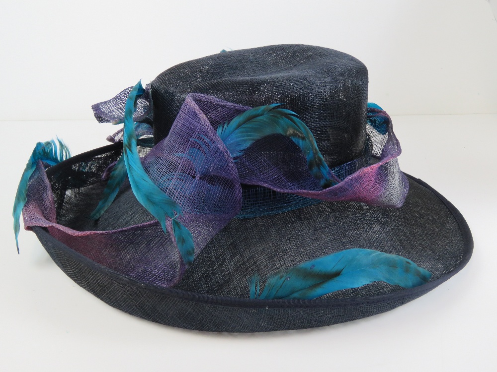 Ladies hat by Helene De Reboul in purples and blues, in box.