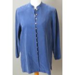 A 100% silk ladies shirt having 'gilt' buttons.