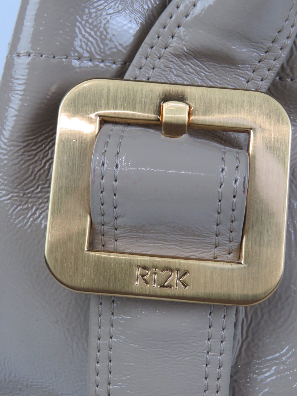 Ri2K; a beige patent ladies handbag, 100% leather outer, with dustbag, approx 17" high x 13" wide. - Image 2 of 6