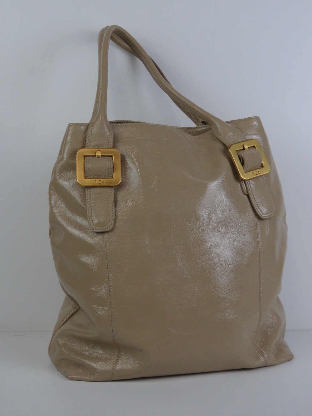 Ri2K; a beige patent ladies handbag, 100% leather outer, with dustbag, approx 17" high x 13" wide. - Image 3 of 6