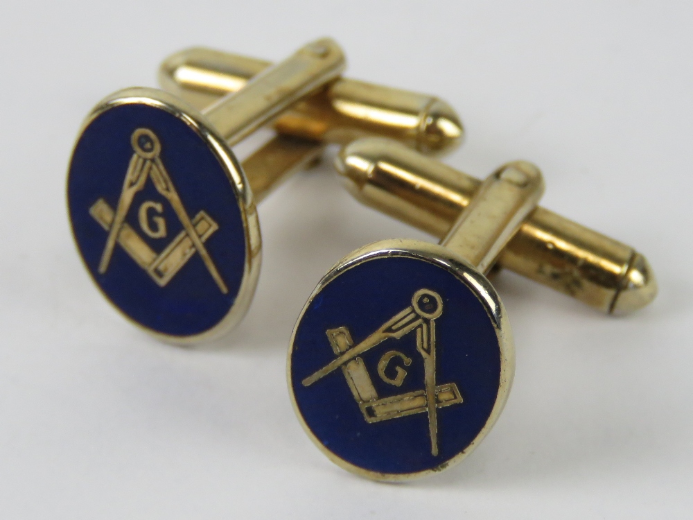 Masonic; a pair of blue enamelled cuffli