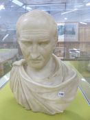 A WHITE MARBLE BUST OF A ROMAN DIGNITARY. H.69cms.