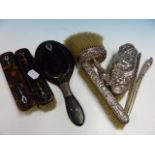 A GROUP OF SILVER AND TORTOISE SHELL MOUNTED DRESSING TABLE ITEMS.