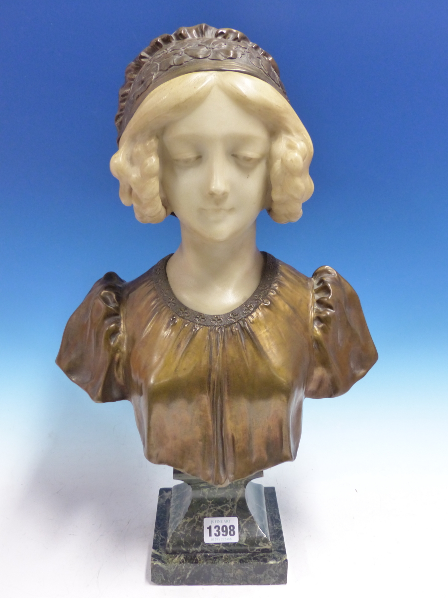 AFFORTUNATO GORY. (FL.1895-1925) A BRONZE AND WHITE MARBLE BUST OF A GIRL WEARING A FLORAL CAP. H.