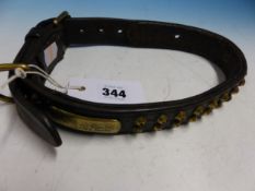 A VINTAGE LEATHER AND BRASS STUDDED DOG COLLAR.