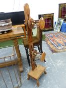 TWO MADDOX PINE WOOL WINDERS CONVERTED INTO LAMPS, THE LAMP SOCKETS WITHIN PAIRS OF SPOOLS