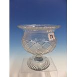 A FOOTED THISTLE SHAPED CLEAR GLASS BOWL, THE BODY WITH STRAWBERRY CUT DIAMOND DIAPER BAND ABOVE
