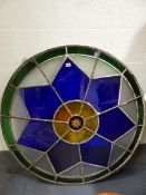 AN IMPRESSIVE ANTIQUE STAINED AND CUT GLASS CIRCULAR LEADED WINDOW/ ROOF LIGHT. Dia.108cms.