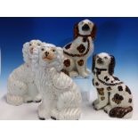 TWO PAIRS OF STAFFORDSHIRE SPANIELS, THE TALLER. H 26cms. TOGETHER WITH THREE STAFFORDSHIRE