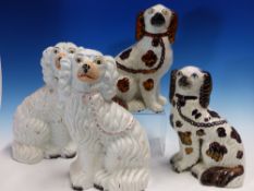 TWO PAIRS OF STAFFORDSHIRE SPANIELS, THE TALLER. H 26cms. TOGETHER WITH THREE STAFFORDSHIRE