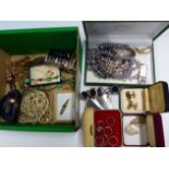 A BOX OF COSTUME JEWELLERY.