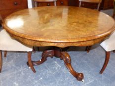 A VICTORIAN FIGURED WALNUT CENTRE TABLE. Dia.120cms.