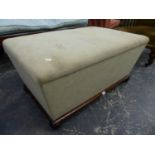 A VICTORIAN BOX OTTOMAN WITH TAPERED SIDES ON TURNED BUN FEET. 94 x 60 x H.45cms.