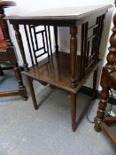 A GODWIN STYLE MAHOGANY TWO SQUARE TIERED TABLE, THE TIERS FLANKED ON TWO SIDES BY A GEOMETRIC