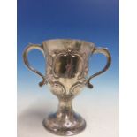 A GEORGIAN SILVER TWO HANDLED CUP WITH LATER DECORATION, LONDON 1758.