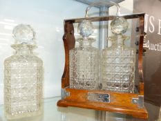 AN EDWARDIAN SILVERPLATE MOUNTED TWO BOTTLE TANTALUS TOGETHER WITH VARIOUS SILVER PLATED WARES. (