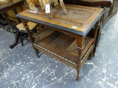 A MOORISH TASTE TWO TIER TABLE, THE EBONISED EDGE OF THE RECTANGULAR TOP ENCLOSING THREE