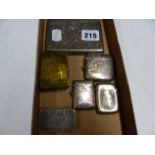 THREE SILVER VESTAS, ANOTHER IN WHITE METAL, A BRASS MATCHBOX SLEEVE AND A SILVER VISITING CARD