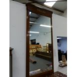 A MAHOGANY FRENCH ORMOLU MOUNTED NEOCLASSICAL STYLE PIER MIRROR. W.98 x H.197cms.