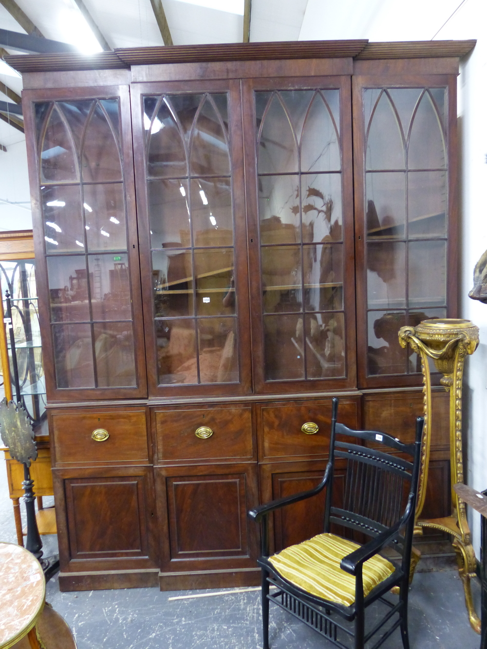 A GEO.III. MAHOGANY SHALLOW BOOKCASE OR APOTHECARY DISPLAY CABINET WITH FOUR GLAZED DOORS OVER PANEL