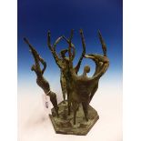 A BRONZE PATINATED COMPOSITION GROUP OF FIVE FIGURES WITH HANDS RAISED AS THEY DANCE ON A